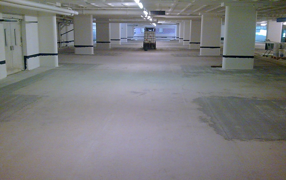 Vloerrenovatie cementgebonden parkeergarage Vloerrenovatie cementgebonden parkeergarage
