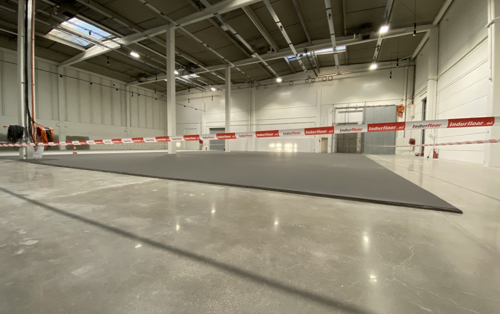 Eindresultaat Industriële gietvloer super vlak Eindresultaat Industriële gietvloer super vlak