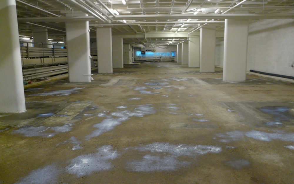 Vloerrenovatie cementgebonden parkeergarage Vloerrenovatie cementgebonden parkeergarage